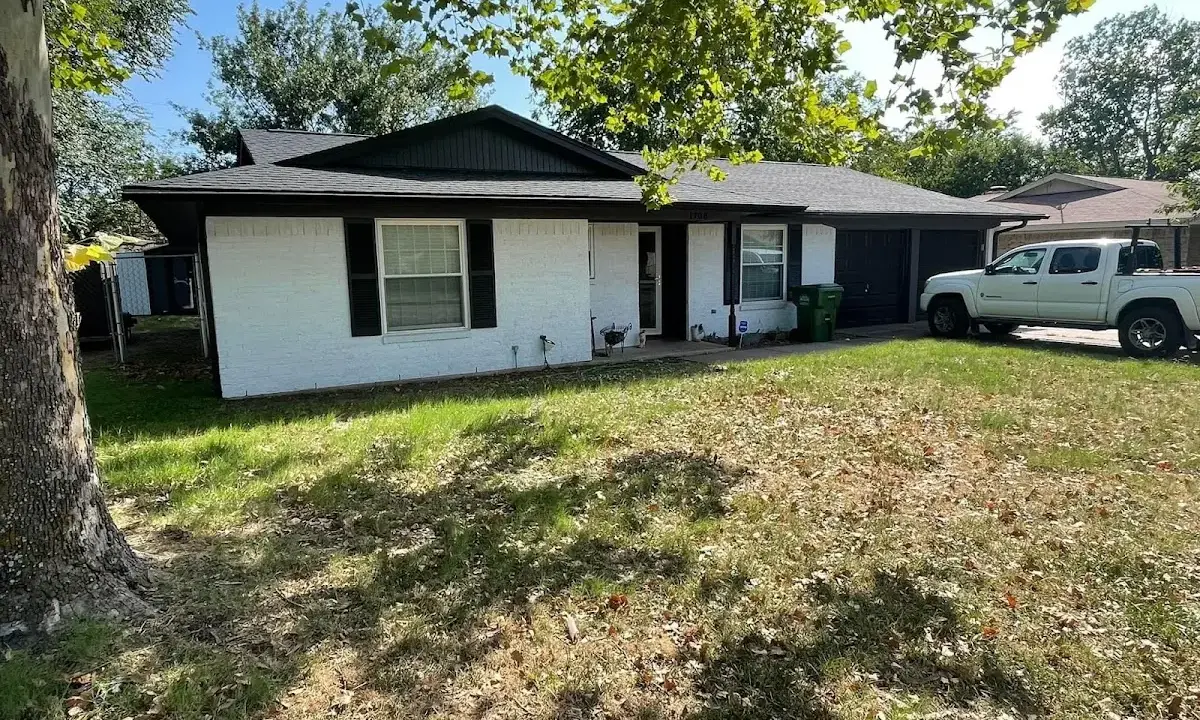Professional roofing crew working on a residential roof in Lower Southampton